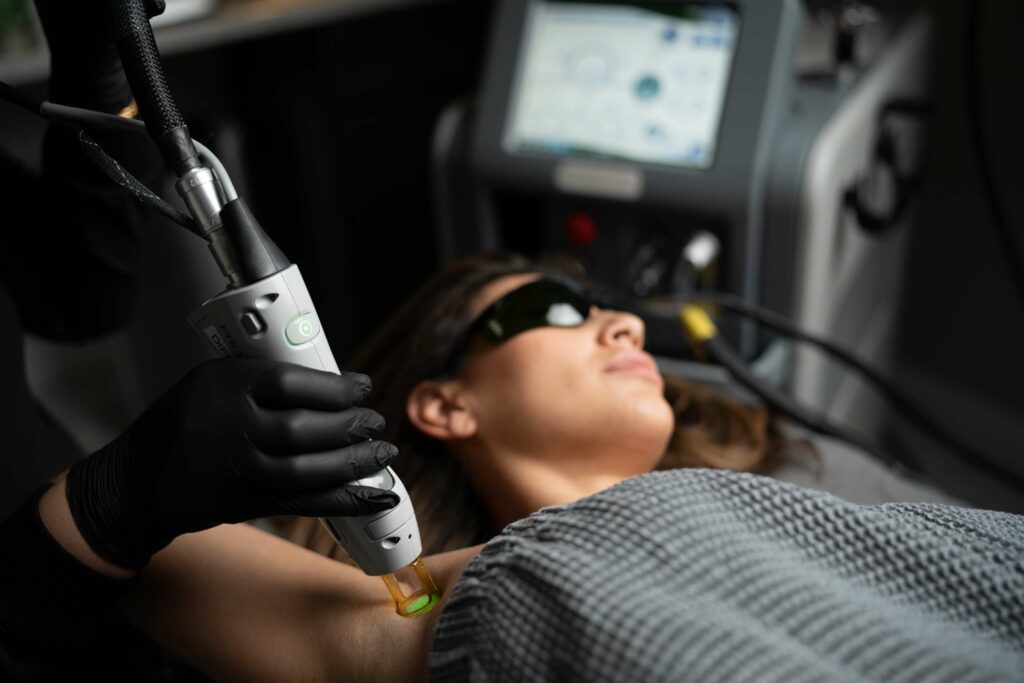 A Woman getting laser hair removal treatment on underarms | Center for Aesthetic Medicine in Las Vegas, NV